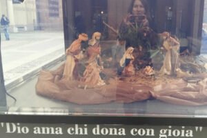 Milano, Italy - "God loves those who give with joy"
